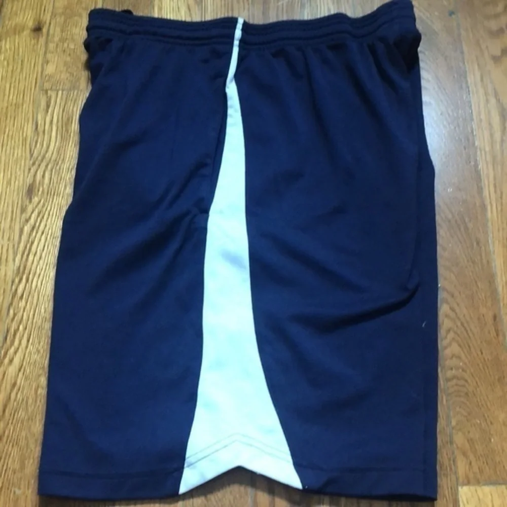 Under armour blue drawstring athleticWorkout shorts with pockets size medium